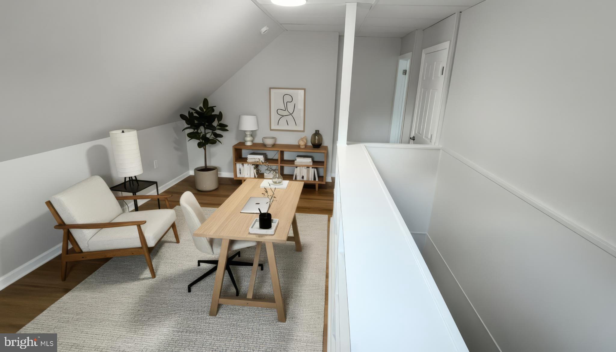 705 2nd Street Delanco, NJ 08075 - Photo 7 of 16 a living room with chairs and a table