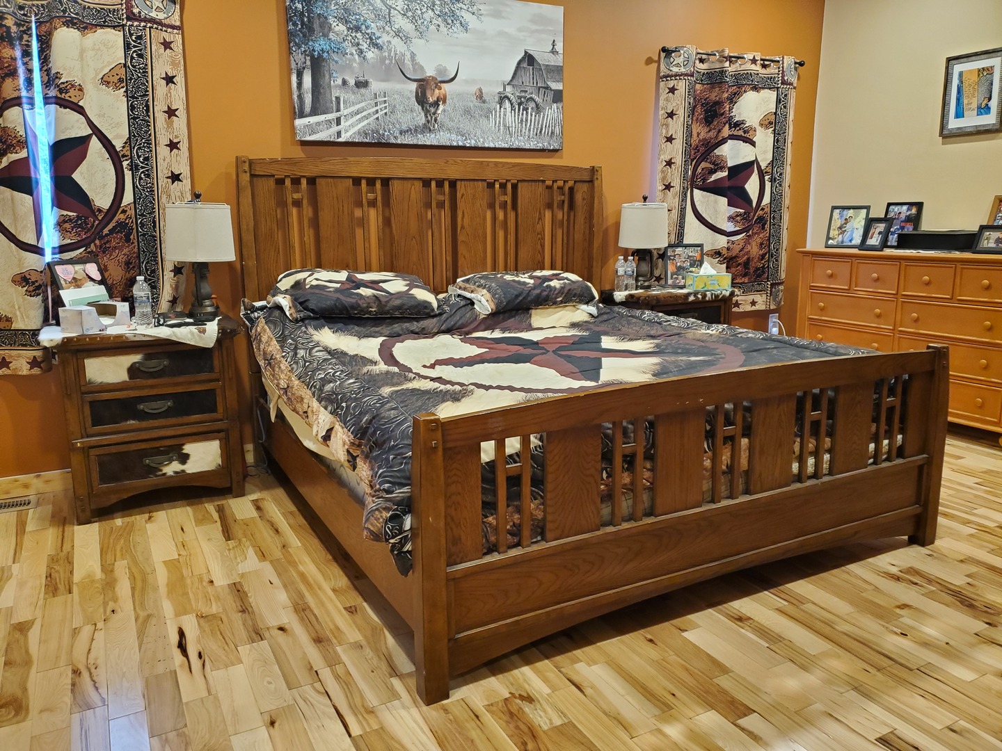 507 North Secor Street Gilman, IL 60938 - Photo 13 of 28 a bed sitting in a bedroom next to a cabinet