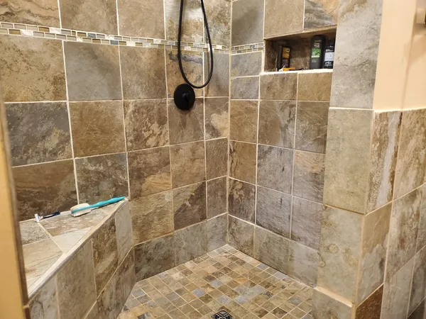 a bathroom with a sink and mirror