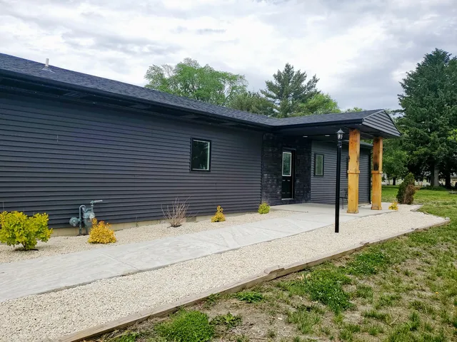 a view of a house with a patio