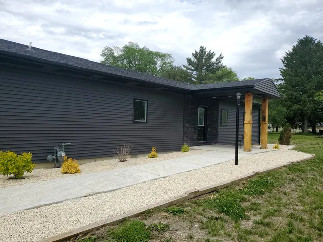 a house with trees in front of it