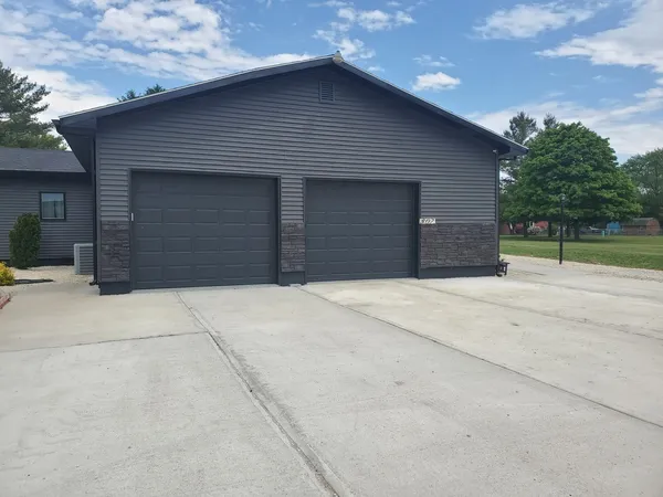 a room with a bed and a fireplace