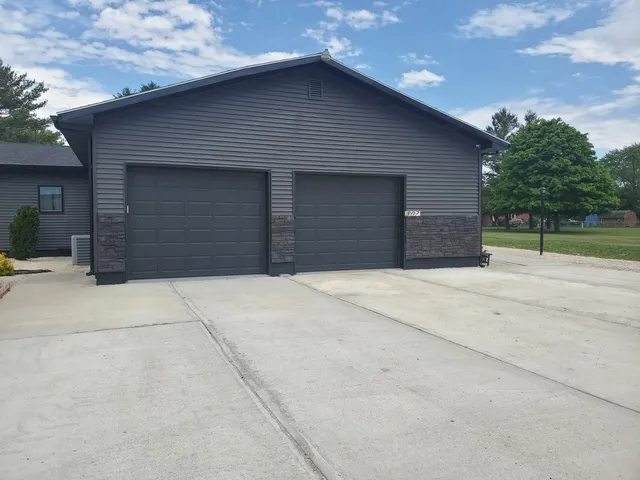 a room with a bed and a fireplace