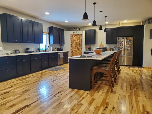 a bedroom with a bed and dresser