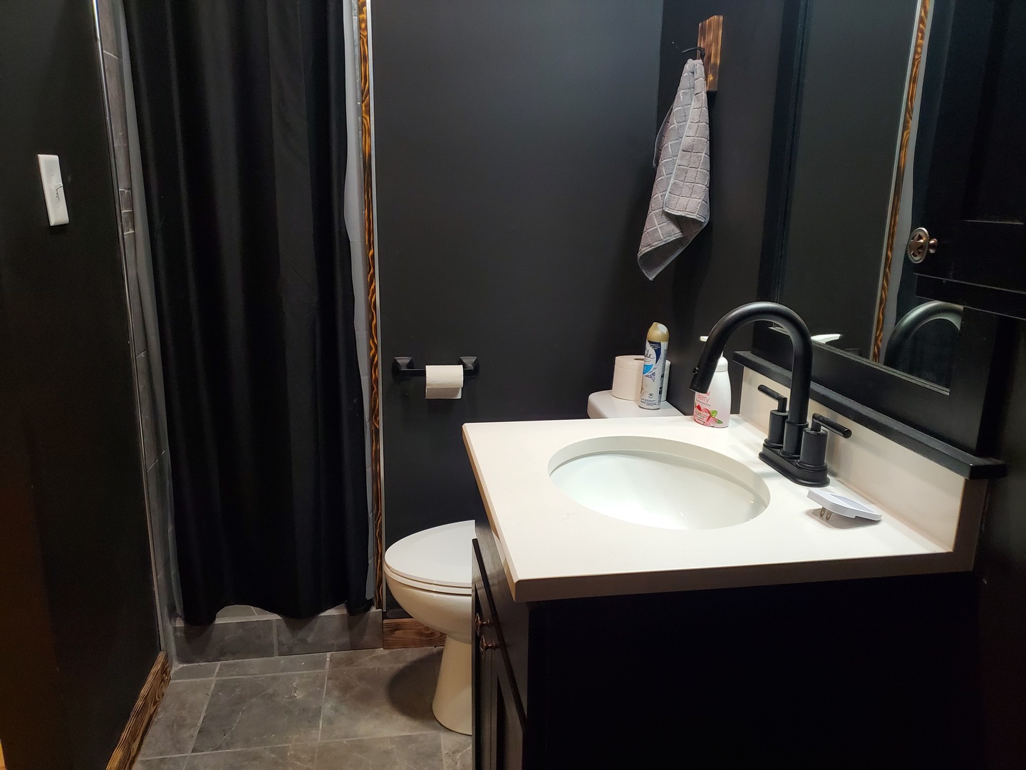 507 North Secor Street Gilman, IL 60938 - Photo 10 of 28 a bathroom with a sink and a mirror