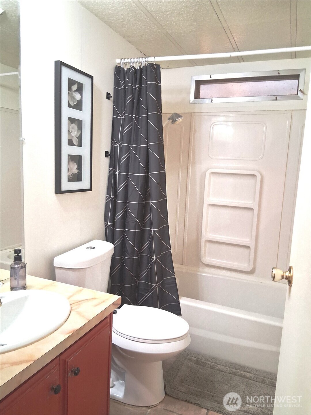 815 124th Street Southwest, Unit 36 Everett, WA 98204 - Photo 20 of 32 a bathroom with a sink a toilet and shower