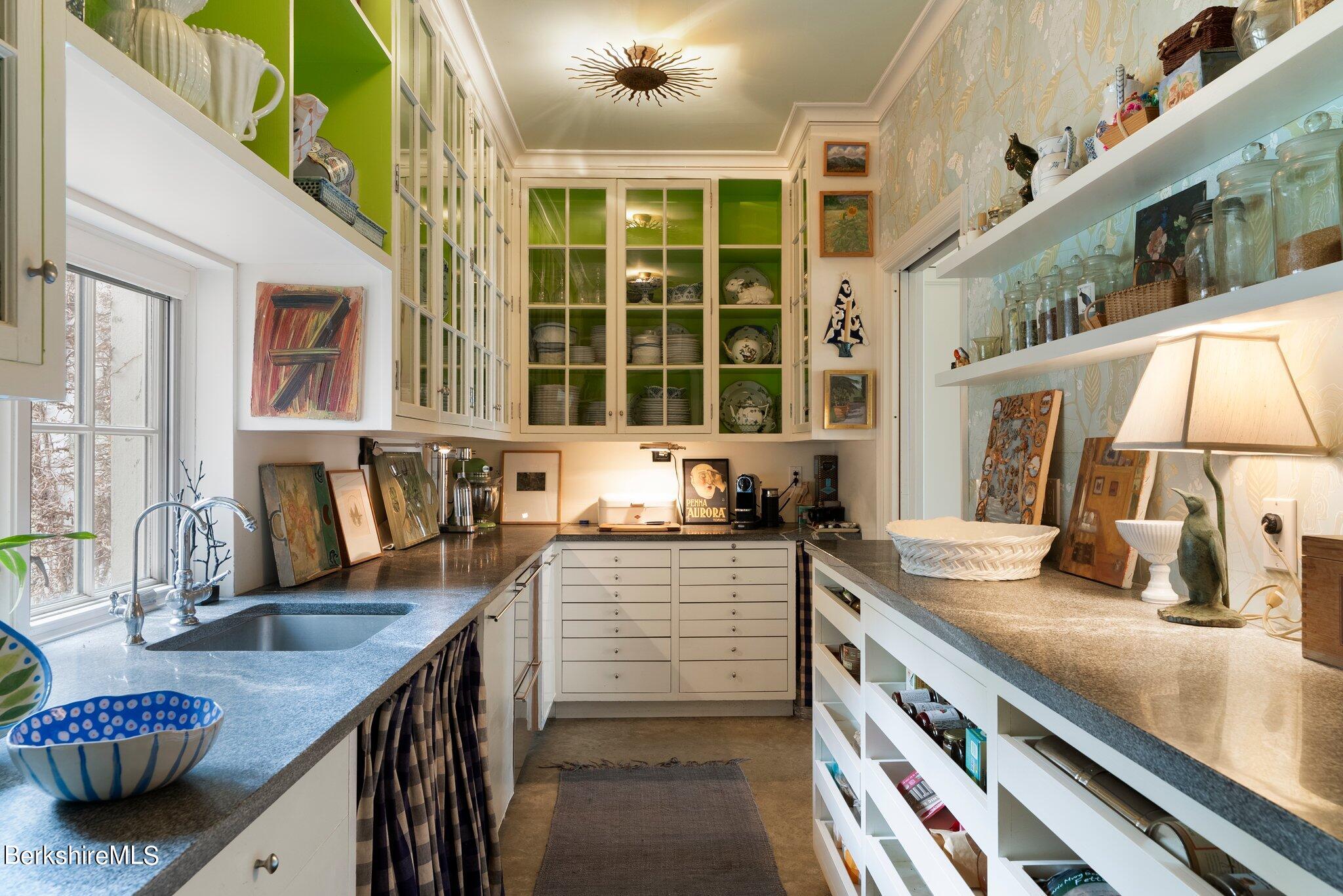 77 Seekonk Cross Road Great Barrington, MA 01230 - Photo 14 of 66 a kitchen with granite countertop a sink and a stove