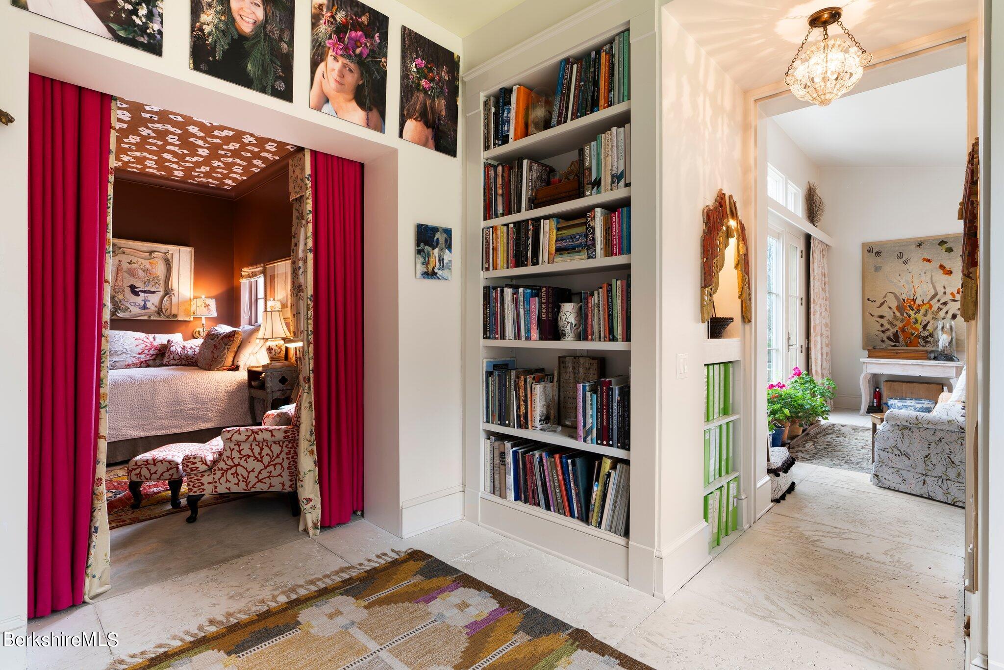 77 Seekonk Cross Road Great Barrington, MA 01230 - Photo 21 of 66 a view of living room with furniture and book shelf
