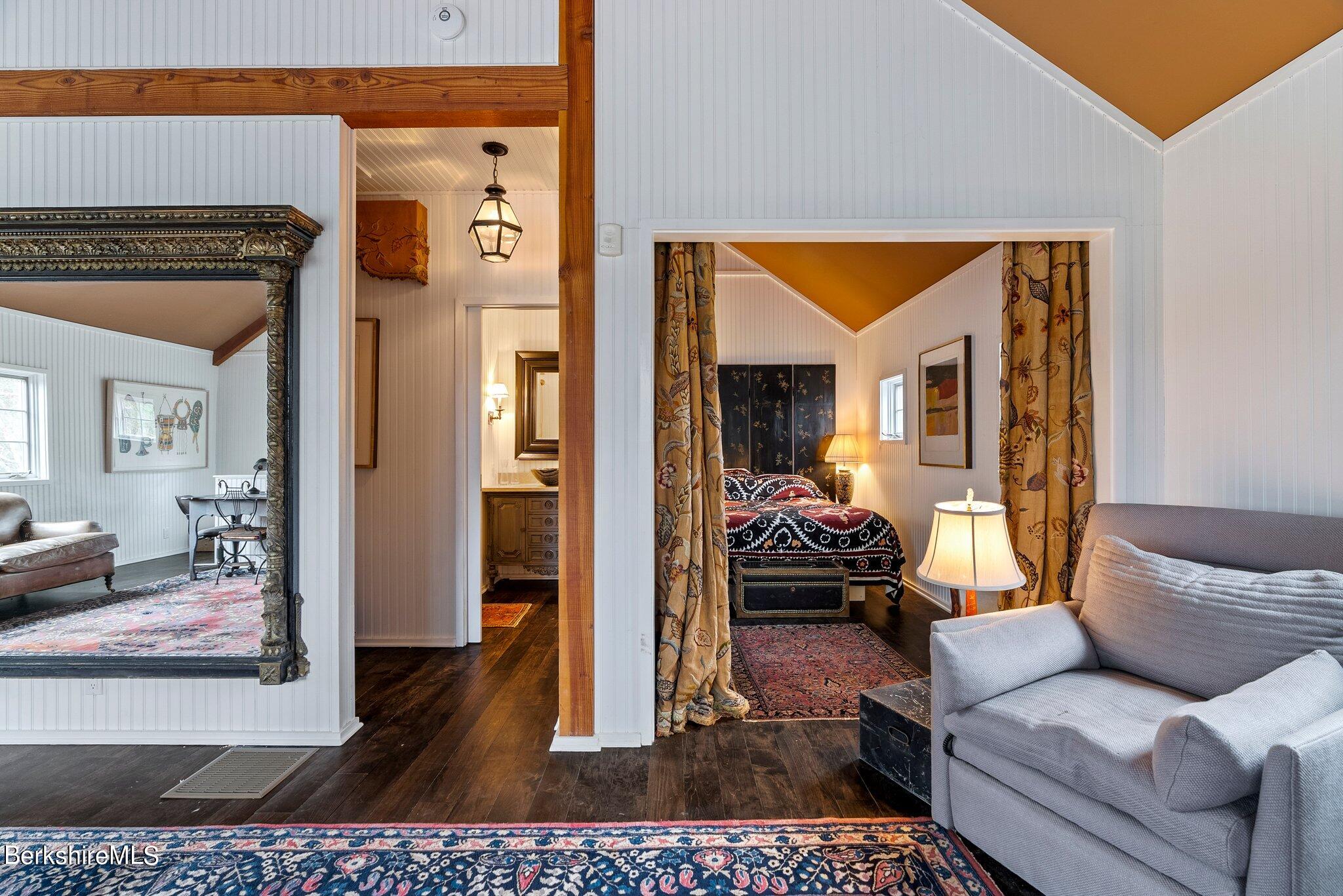 77 Seekonk Cross Road Great Barrington, MA 01230 - Photo 48 of 66 a living room with furniture and a table