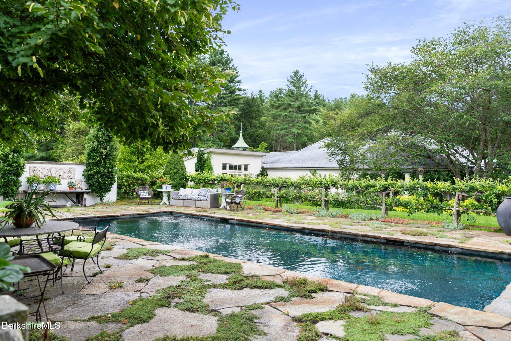 77 Seekonk Cross Road Great Barrington, MA 01230 - Photo 51 of 66 a view of a lake with a house swimming pool and outdoor space