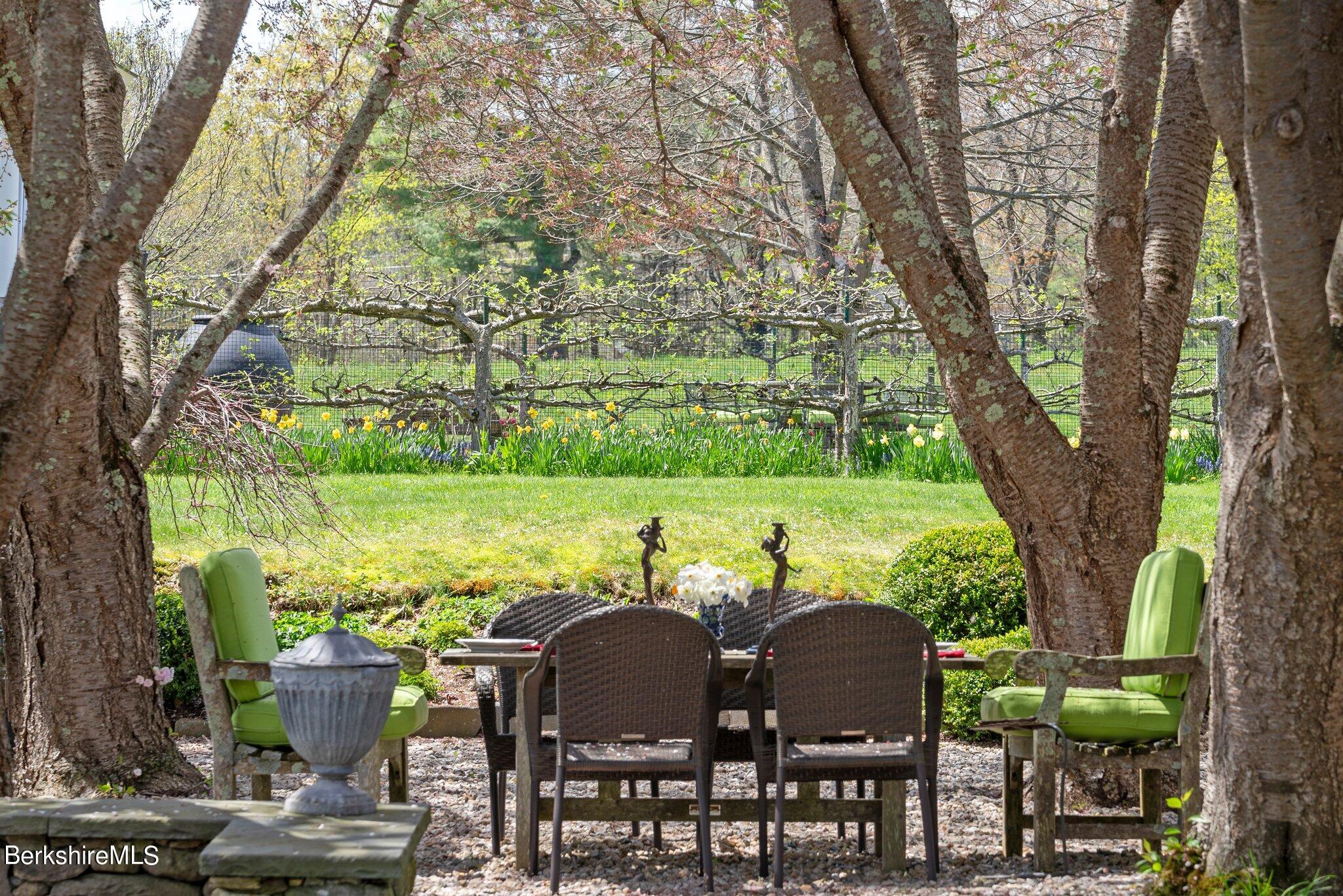 77 Seekonk Cross Road Great Barrington, MA 01230 - Photo 59 of 66 a view of a chairs and table in the patio