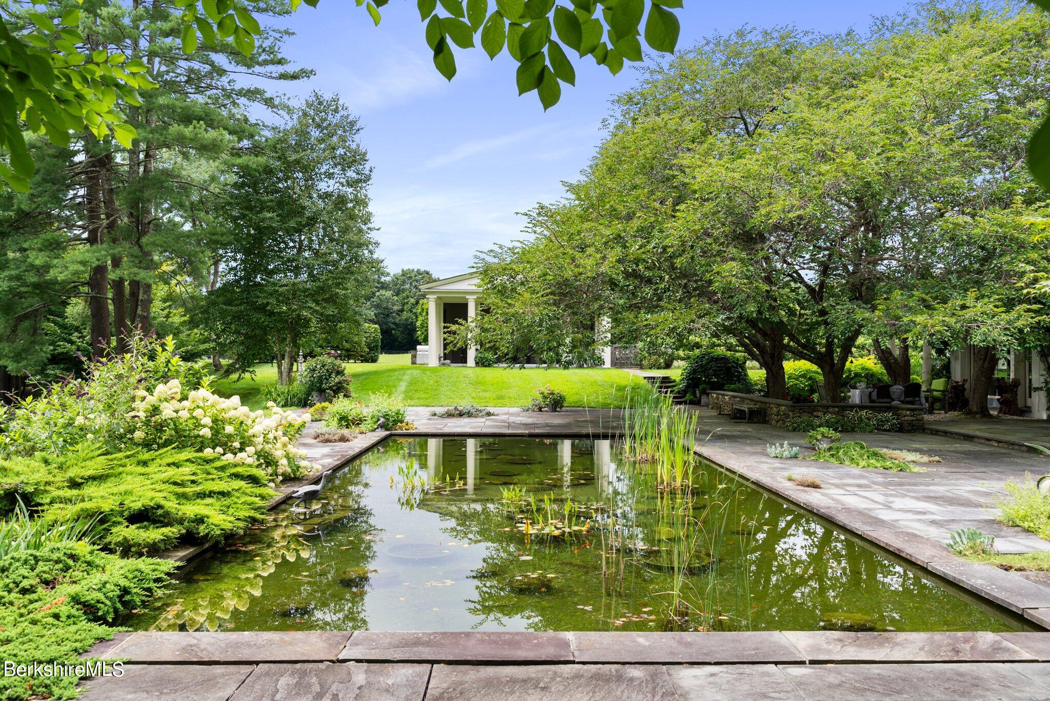 77 Seekonk Cross Road Great Barrington, MA 01230 - Photo 66 of 66 a view of a swimming pool with a patio
