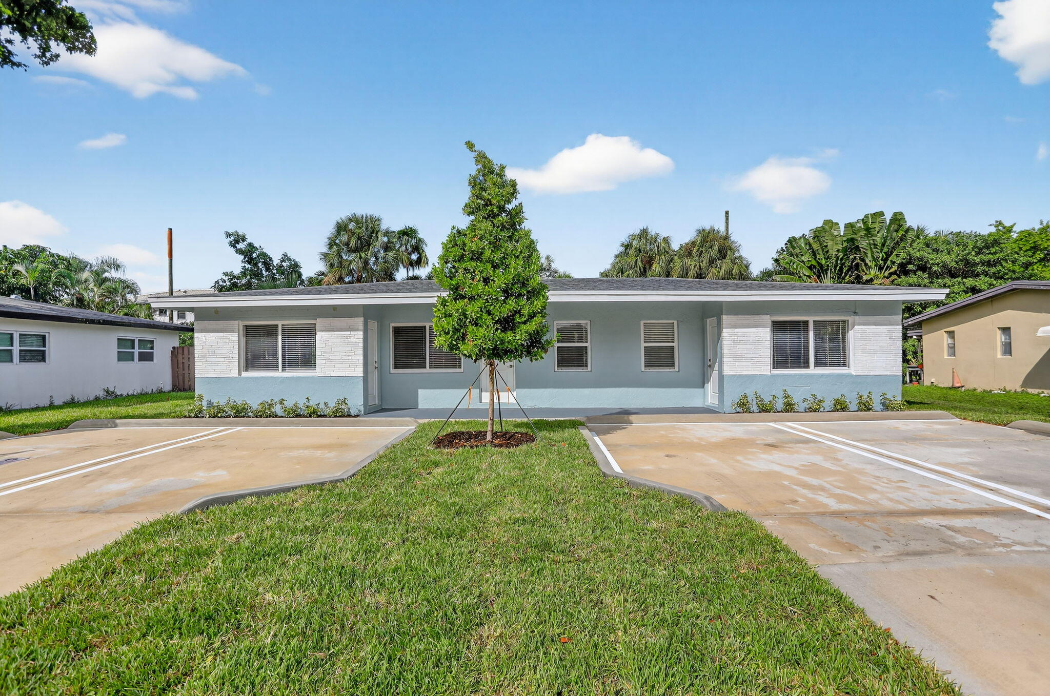 front view of a house with a patio