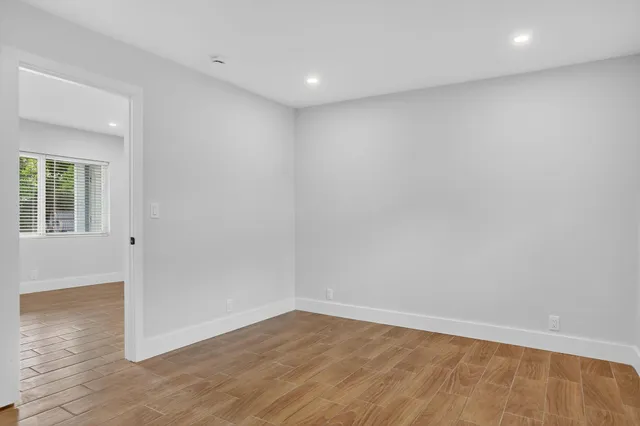 a bathroom with a shower toilet and a shower