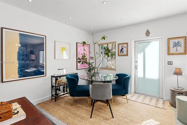 a view of a livingroom with furniture and window