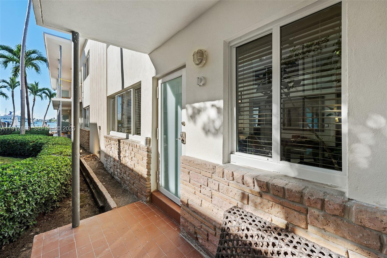1120 Venetian Way, Unit 1D Miami, FL 33139 - Photo 7 of 11 a view of balcony with wooden floor