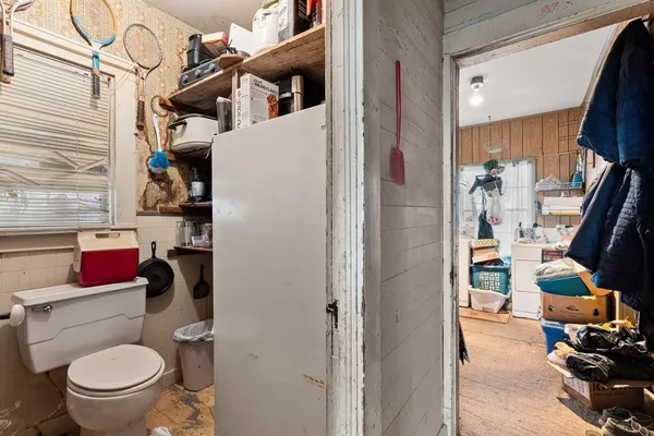 a room with furniture and a chandelier