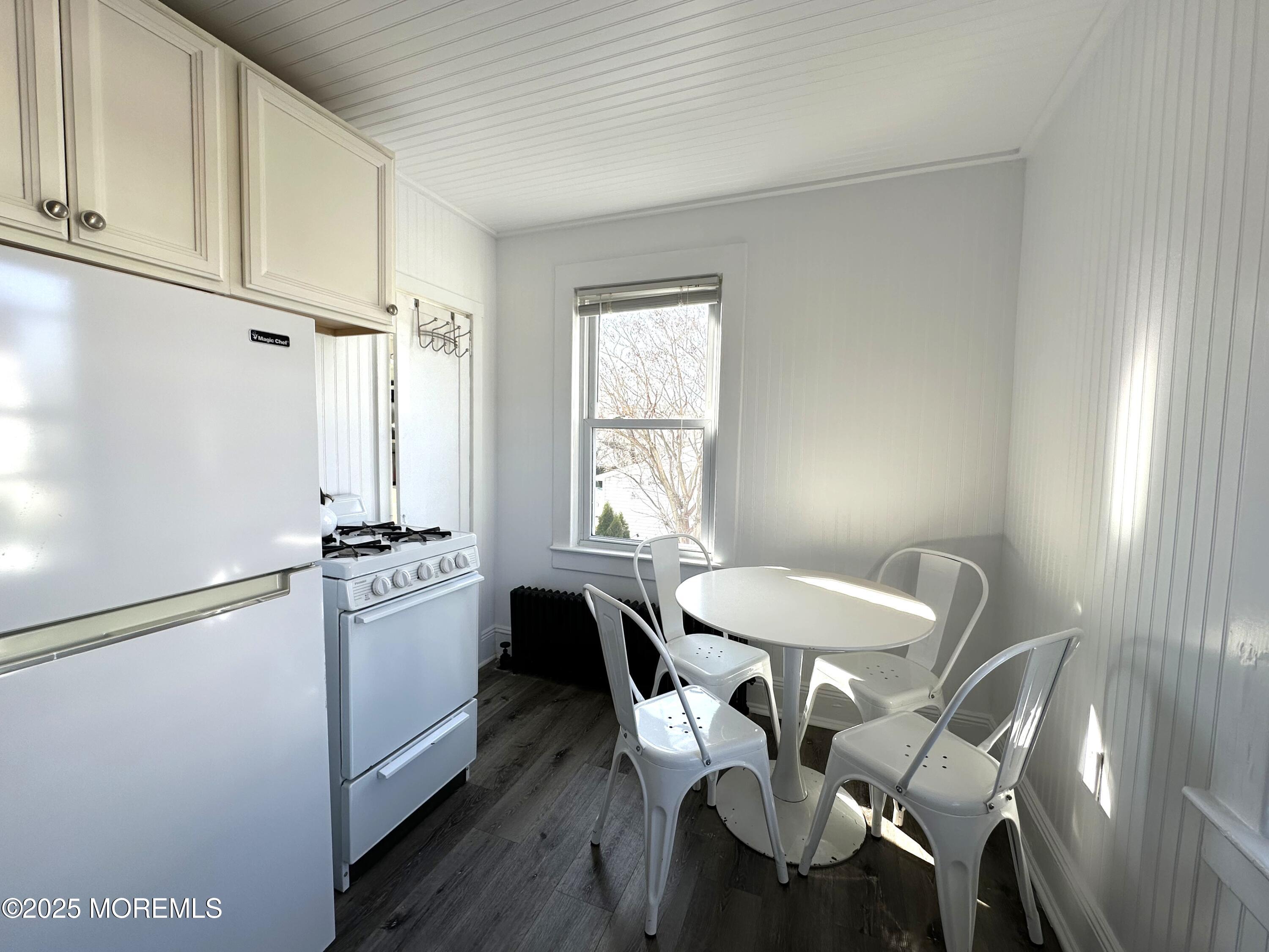 506 7th Avenue, Unit REAR Belmar, NJ 07719 - Photo 6 of 16 a dining room with furniture and window