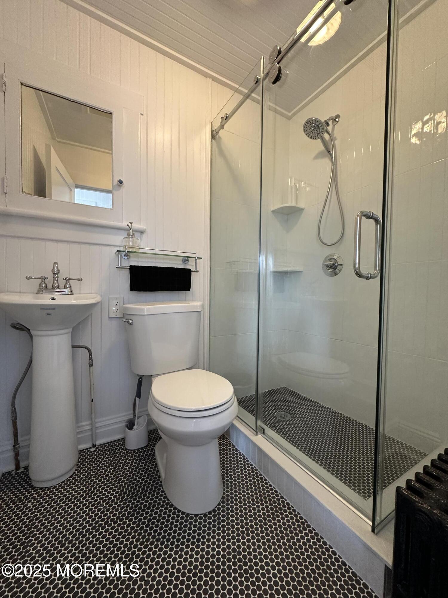 506 7th Avenue, Unit REAR Belmar, NJ 07719 - Photo 8 of 16 a bathroom with a sink toilet and shower