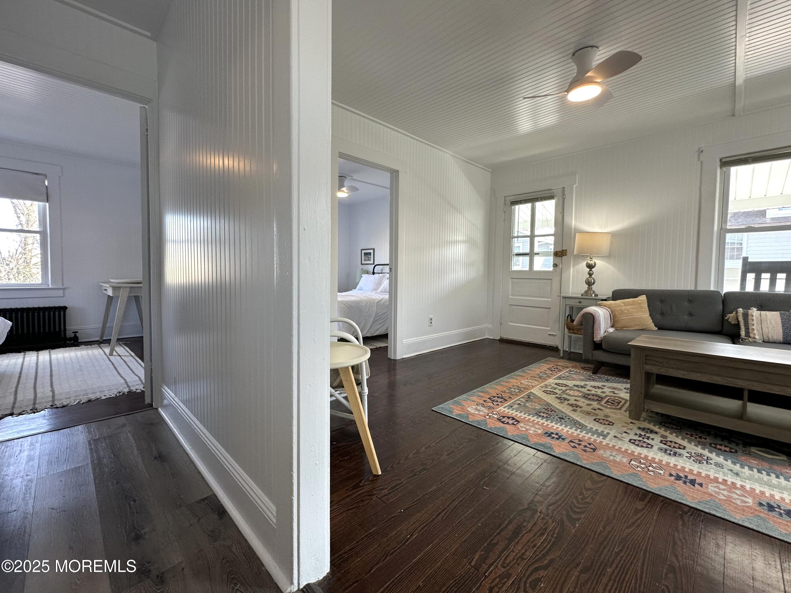 506 7th Avenue, Unit REAR Belmar, NJ 07719 - Photo 10 of 16 a living room with furniture and a rug