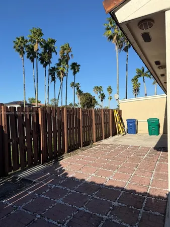 a view of a wooden fence
