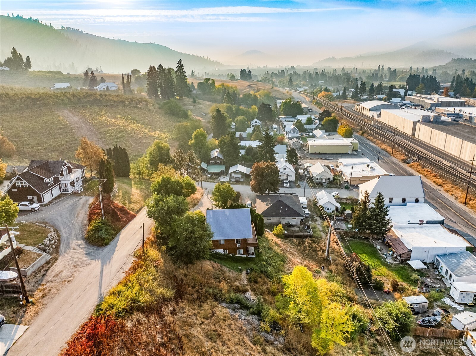 14 High Street Peshastin, WA 98847 - Photo 7 of 12 an aerial view of residential building and lake