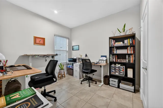 a workspace with a bookshelf
