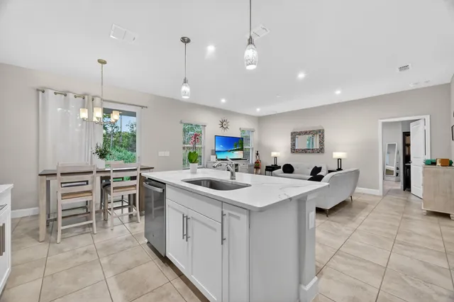 a kitchen with a sink and counter top space
