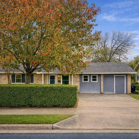 front view of house with a yard