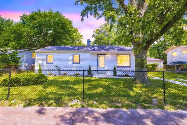 a view of a house with swimming pool