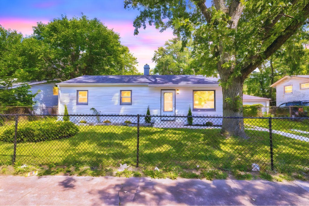 a view of a house with swimming pool