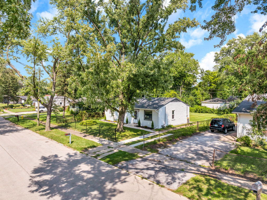 15417 Cherry Lane Markham, IL 60428 - Photo 15 of 24 a view of a house with a yard