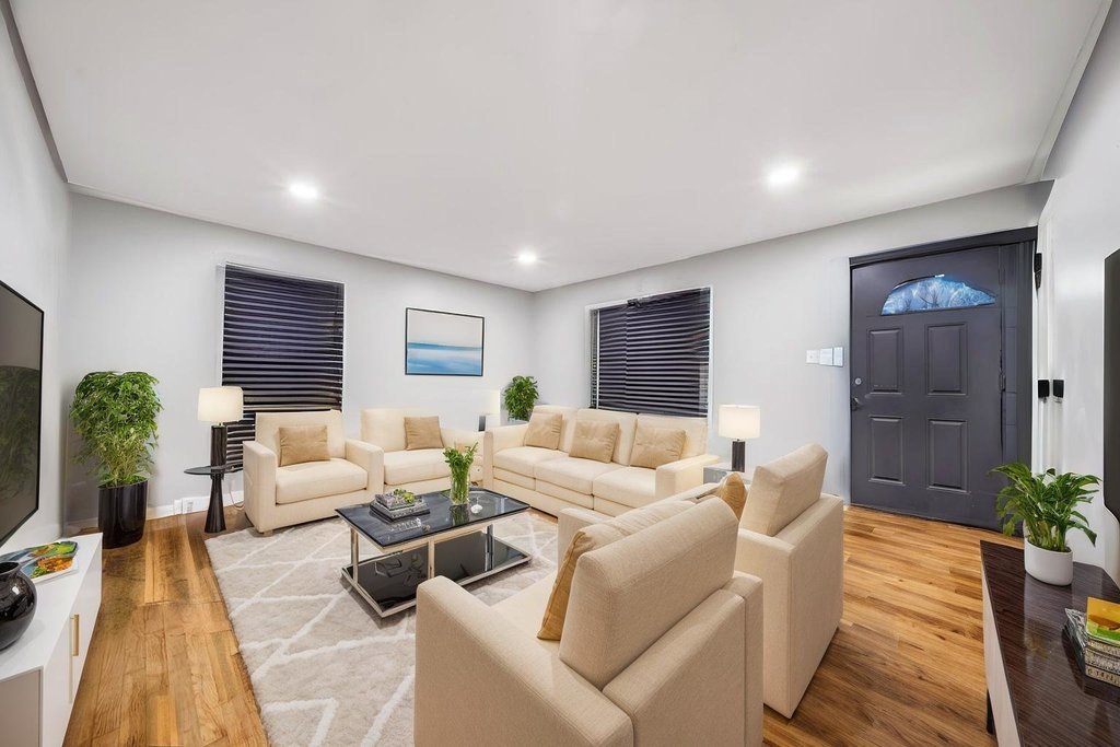 15417 Cherry Lane Markham, IL 60428 - Photo 2 of 24 a living room with furniture and a wooden floor