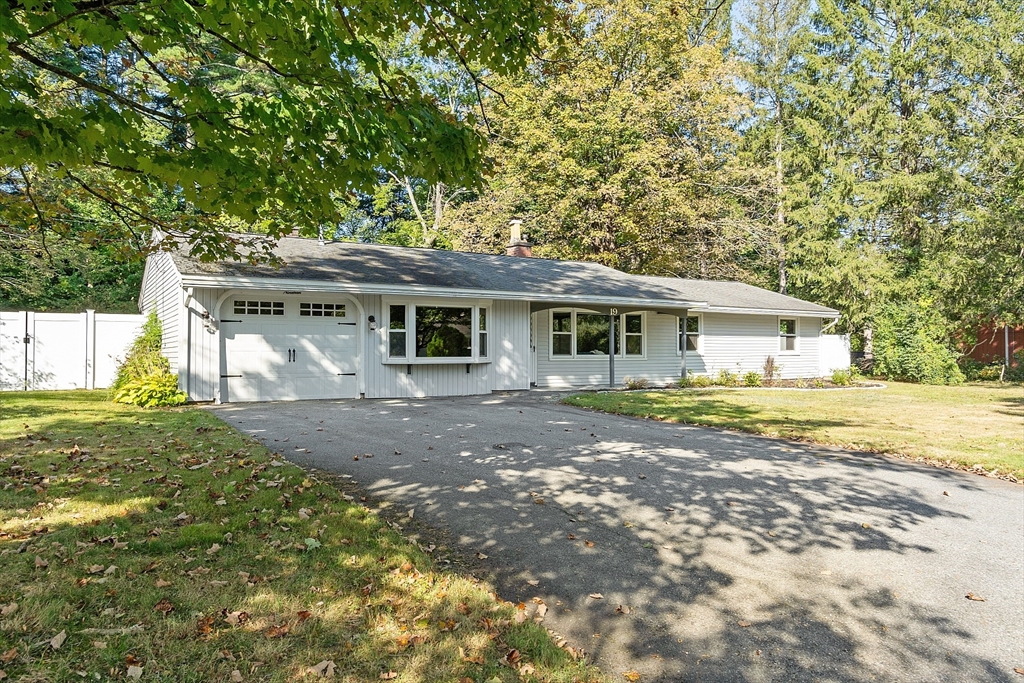 19 Donna Road Chelmsford, MA 01824 - Photo 1 of 1 a view of a house with a yard and large tree