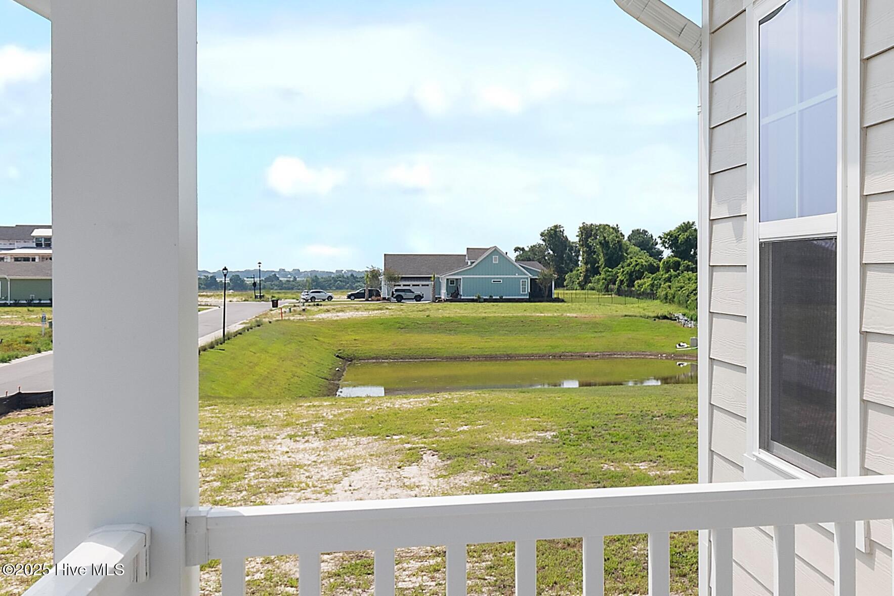 244 Planters Walk Hampstead, NC 28443 - Photo 46 of 86 Balcony View of Intracoastal Waterway off Primary Bedroom on Second Floor