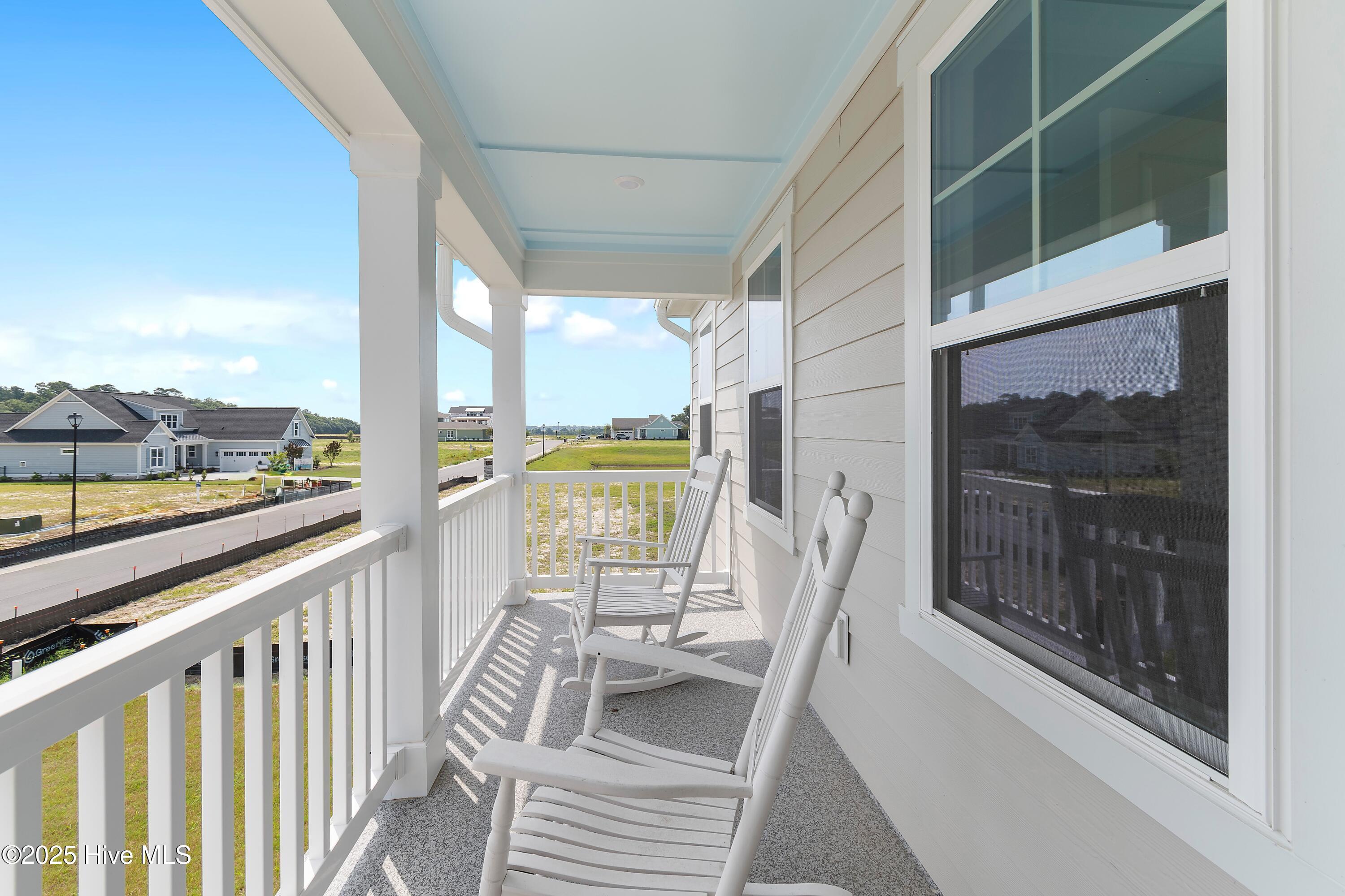 244 Planters Walk Hampstead, NC 28443 - Photo 51 of 86 Balcony off Primary Bedroom on Second Floor
