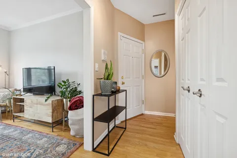 a view of a livingroom with furniture and a flat screen tv