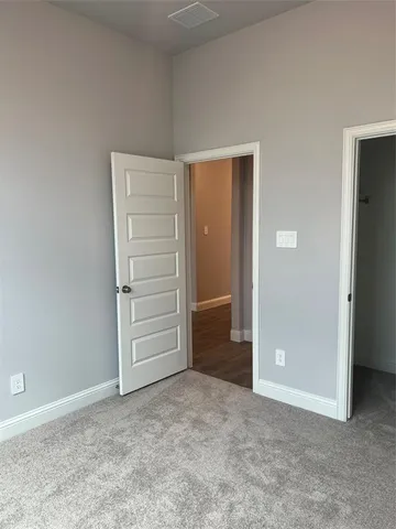 a view of walk in closet with cabinet