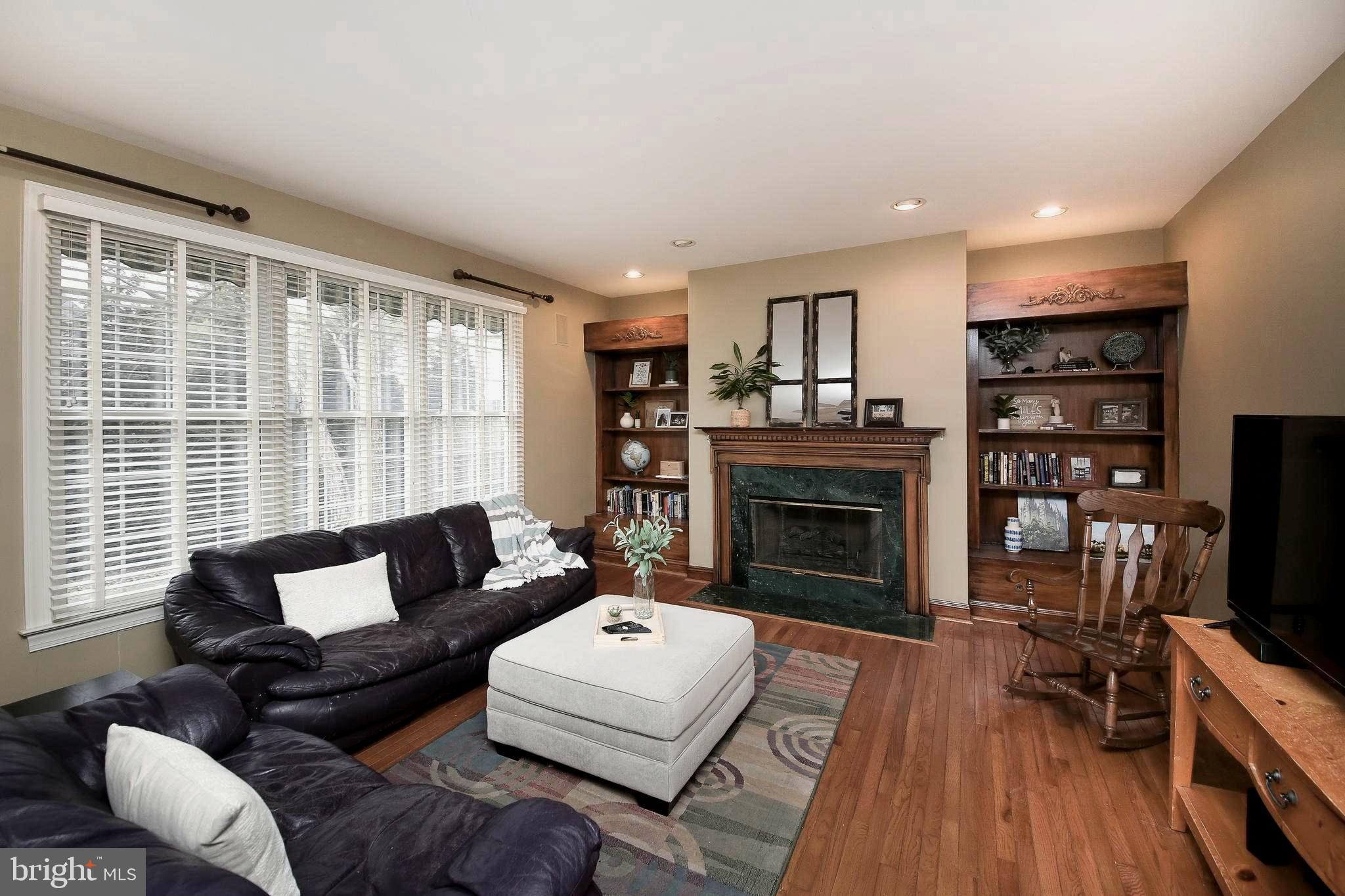 703 Talamore Drive Ambler, PA 19002 - Photo 13 of 35 Family room with gas fireplace