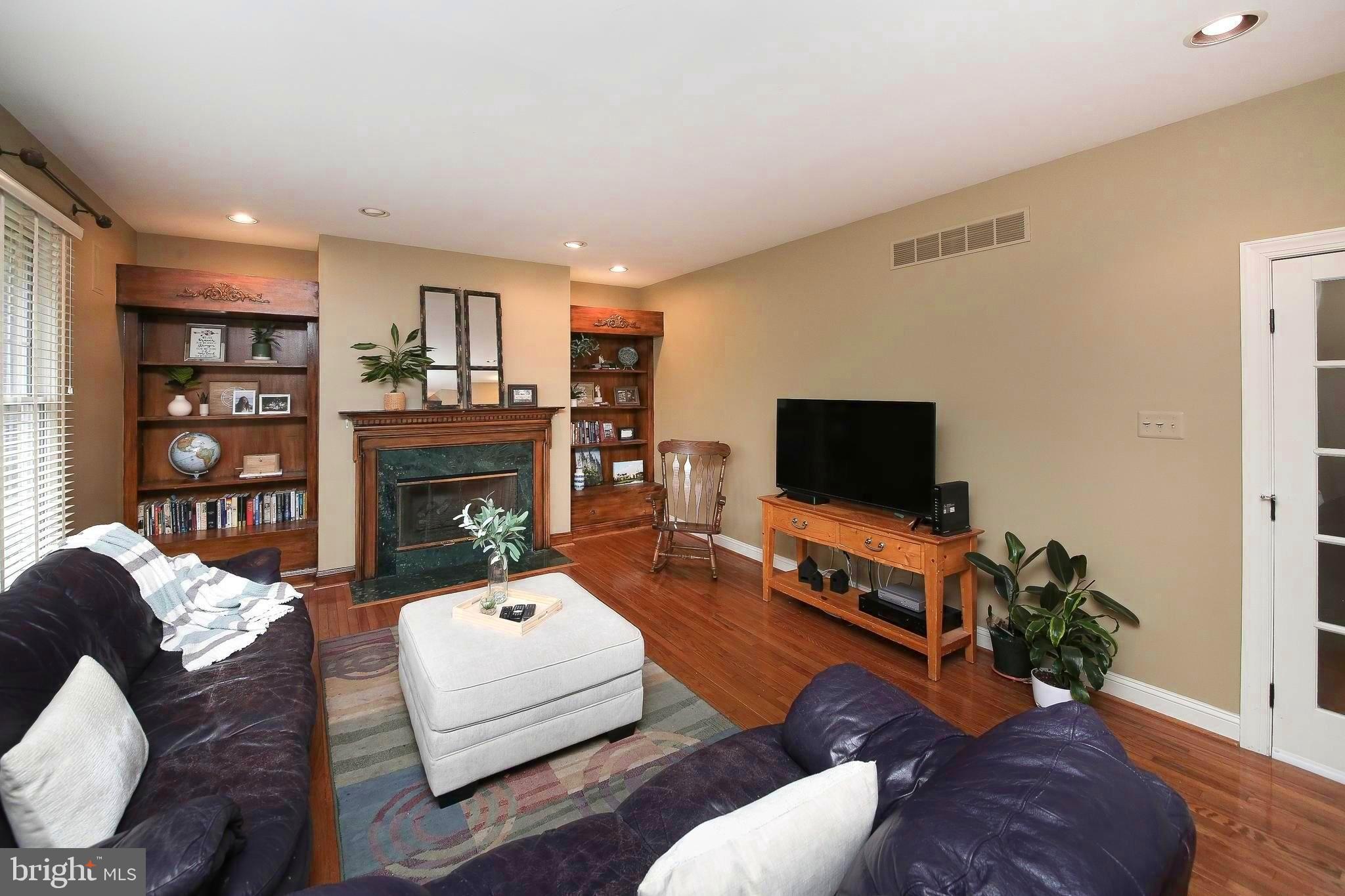 703 Talamore Drive Ambler, PA 19002 - Photo 14 of 35 Family room with built in cabinets