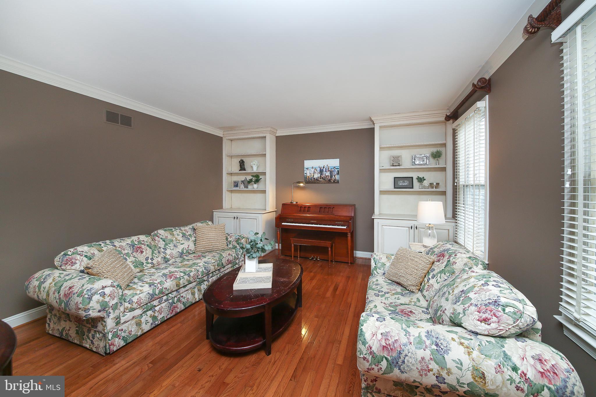 703 Talamore Drive Ambler, PA 19002 - Photo 6 of 35 Living room with built in cabinets