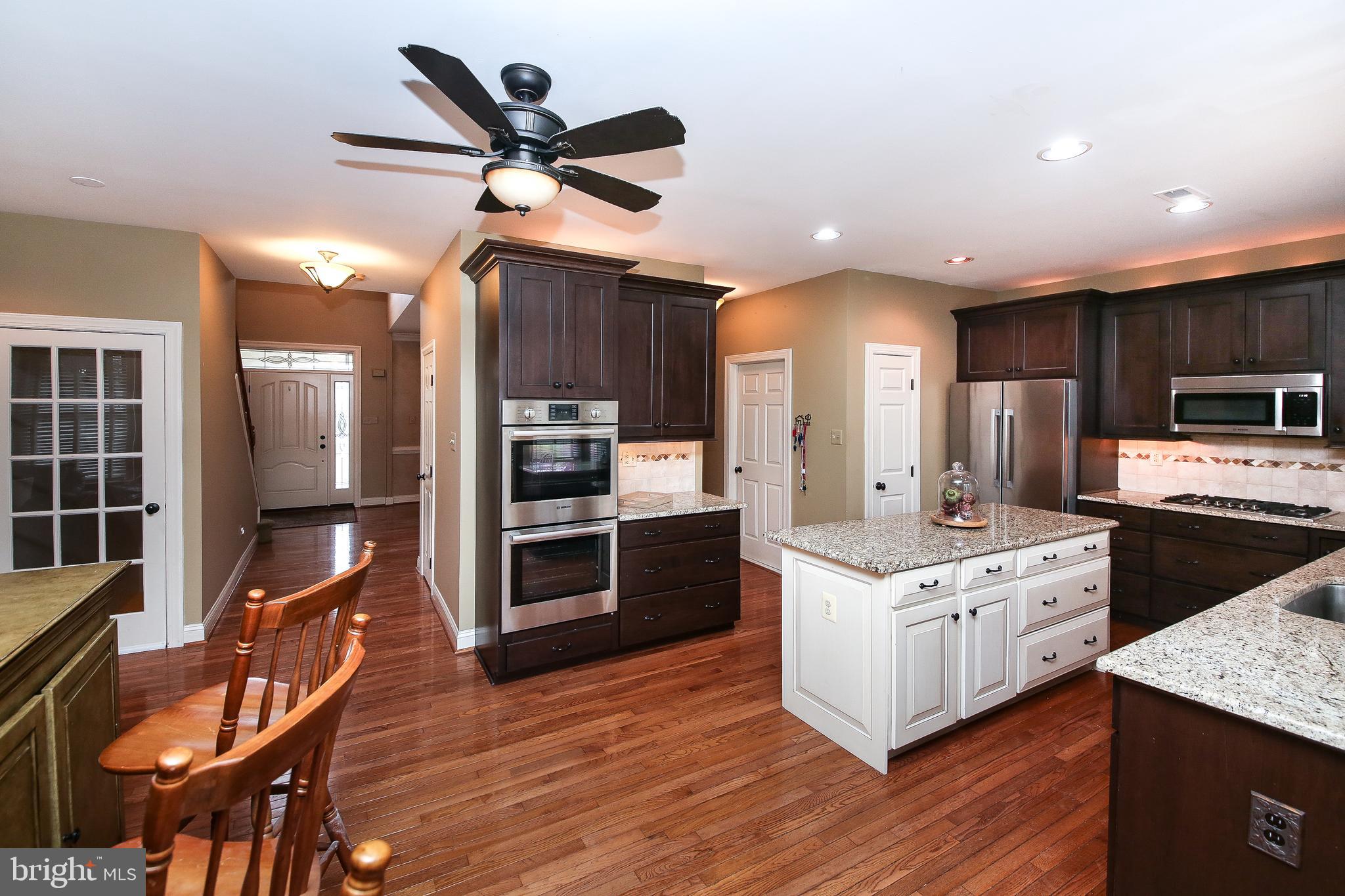 703 Talamore Drive Ambler, PA 19002 - Photo 9 of 35 Kitchen with island and granite counters