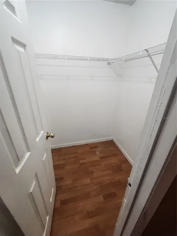 a view of a room with racks on the wall