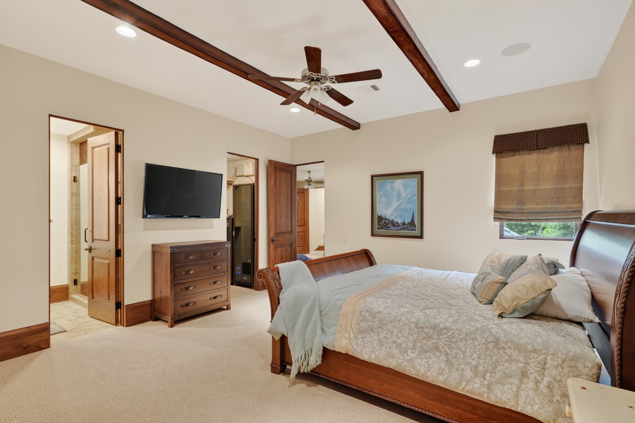 247 South Fazio Way Spring, TX 77389 - Photo 42 of 50 a bedroom with a bed and a flat screen tv