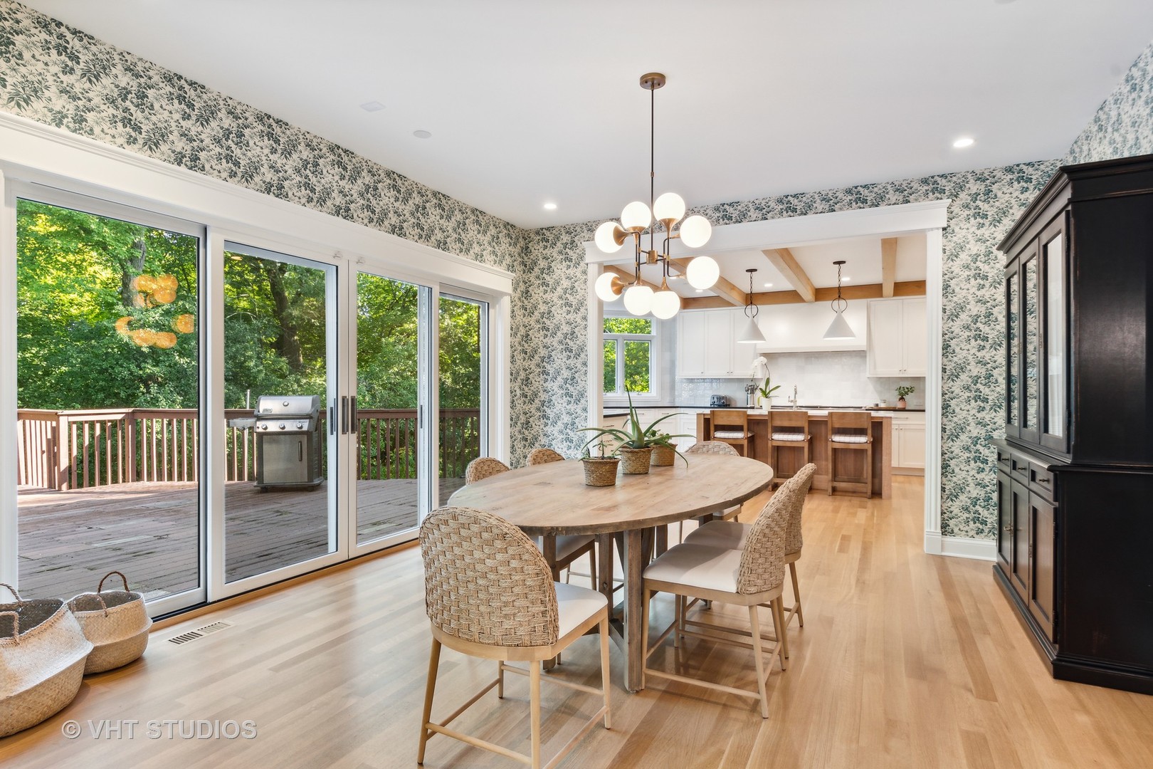 37 Sheridan Road Highland Park, IL 60035 - Photo 11 of 48 a view of a dining room and livingroom with furniture wooden floor a chandelier