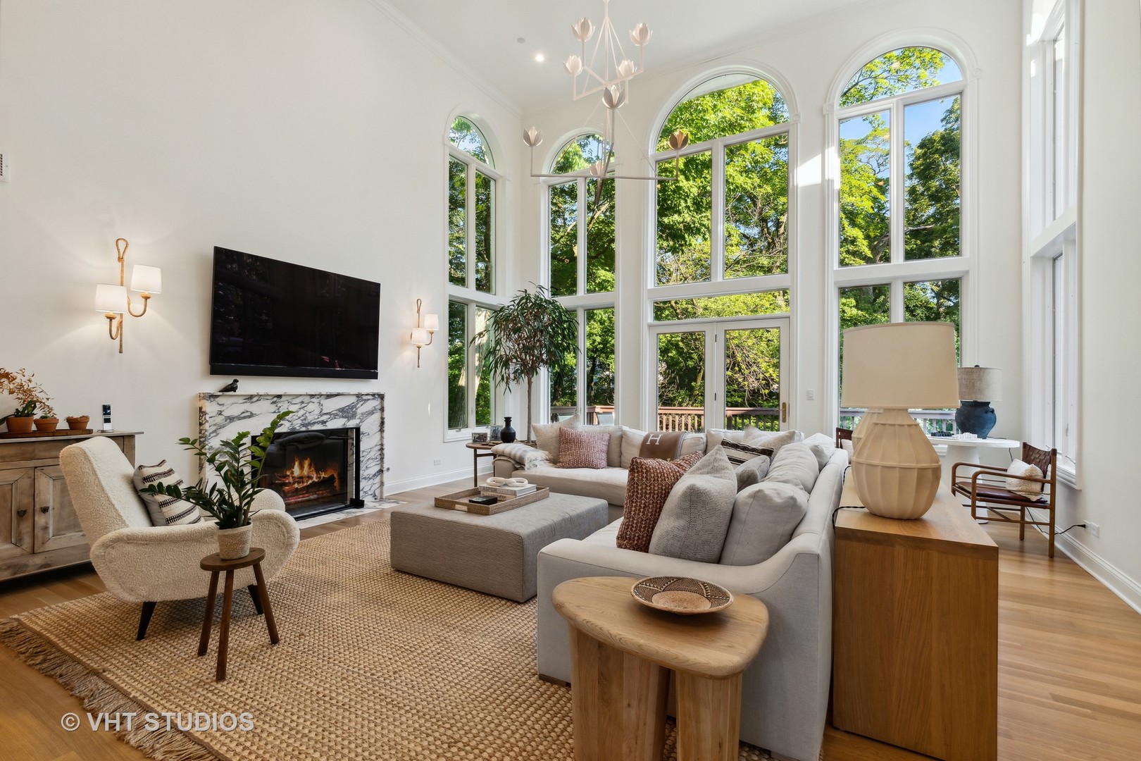 37 Sheridan Road Highland Park, IL 60035 - Photo 14 of 48 a living room with furniture a fireplace and a flat screen tv