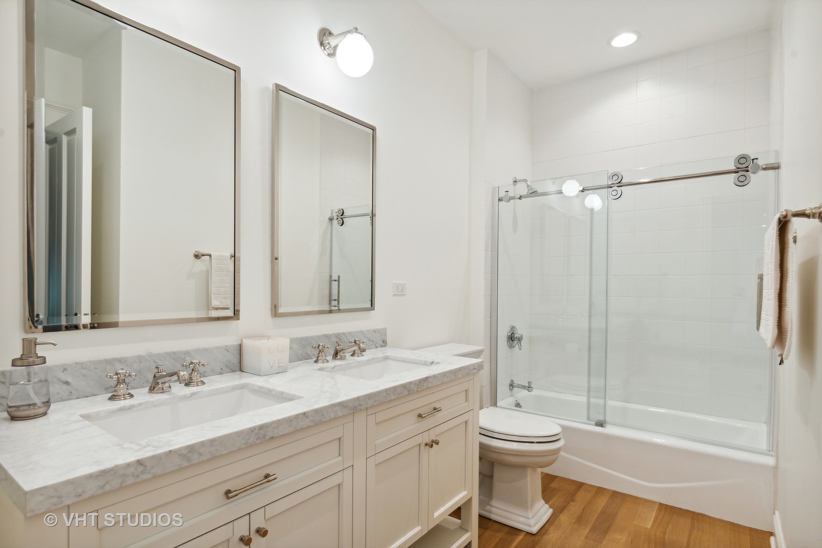 37 Sheridan Road Highland Park, IL 60035 - Photo 22 of 48 a bathroom with a granite countertop sink toilet and shower