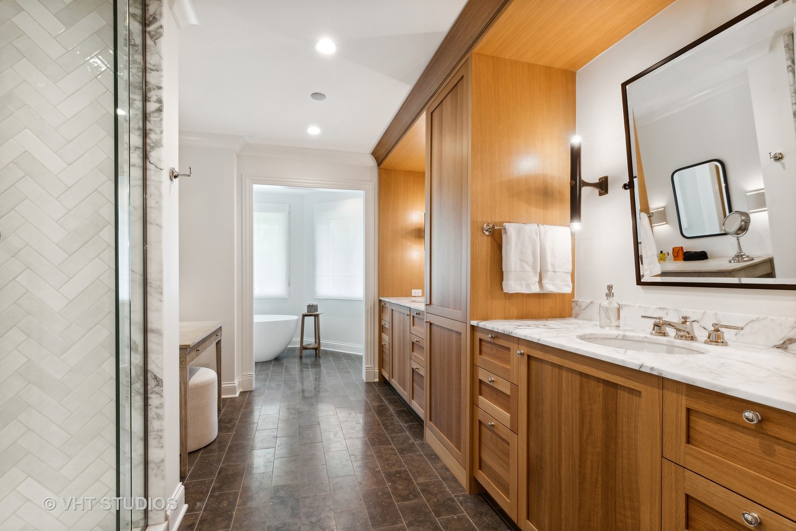 37 Sheridan Road Highland Park, IL 60035 - Photo 30 of 48 a spacious bathroom with a double vanity sink and a mirror