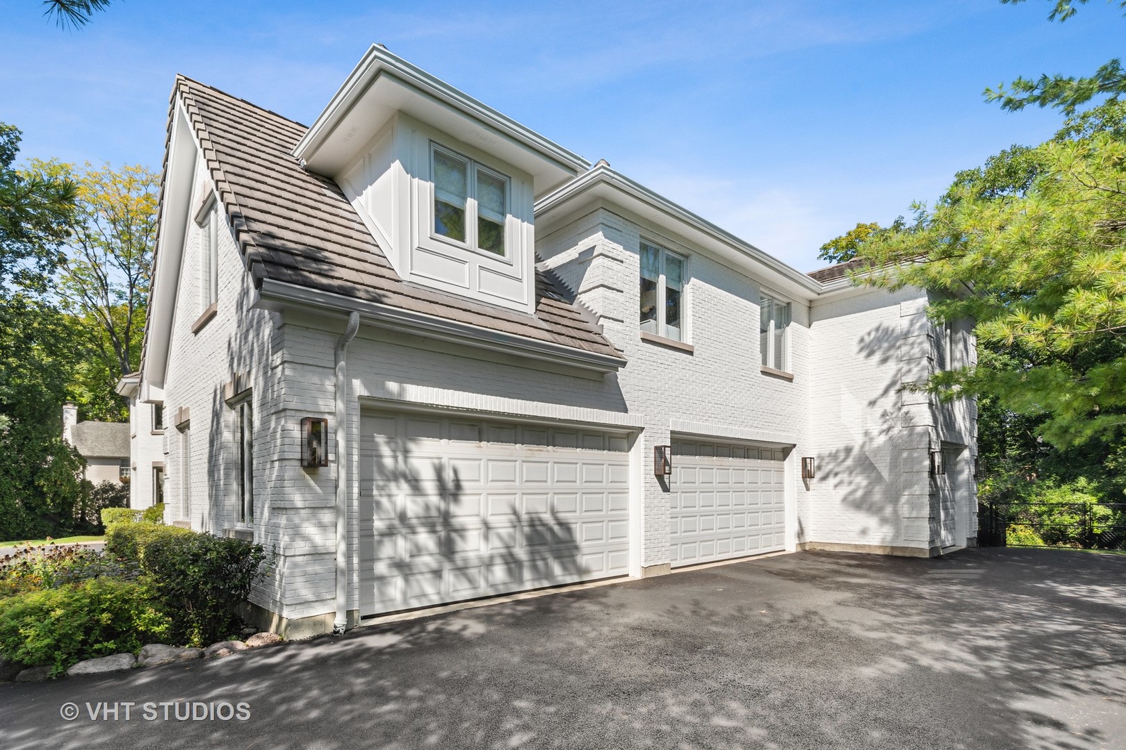 37 Sheridan Road Highland Park, IL 60035 - Photo 43 of 48 a front view of a house with a garage