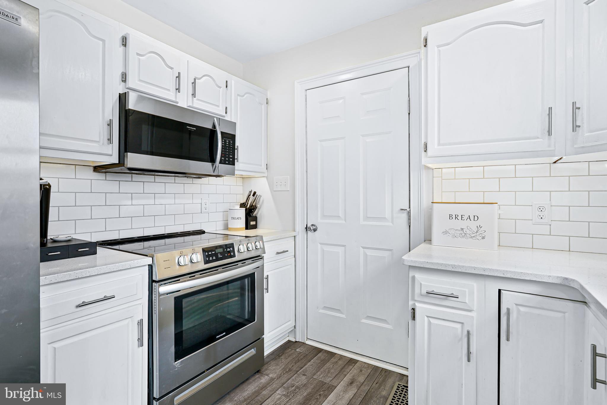1460 Oldfield Point Road Elkton, MD 21921 - Photo 8 of 28 Kitchen with door to the garage